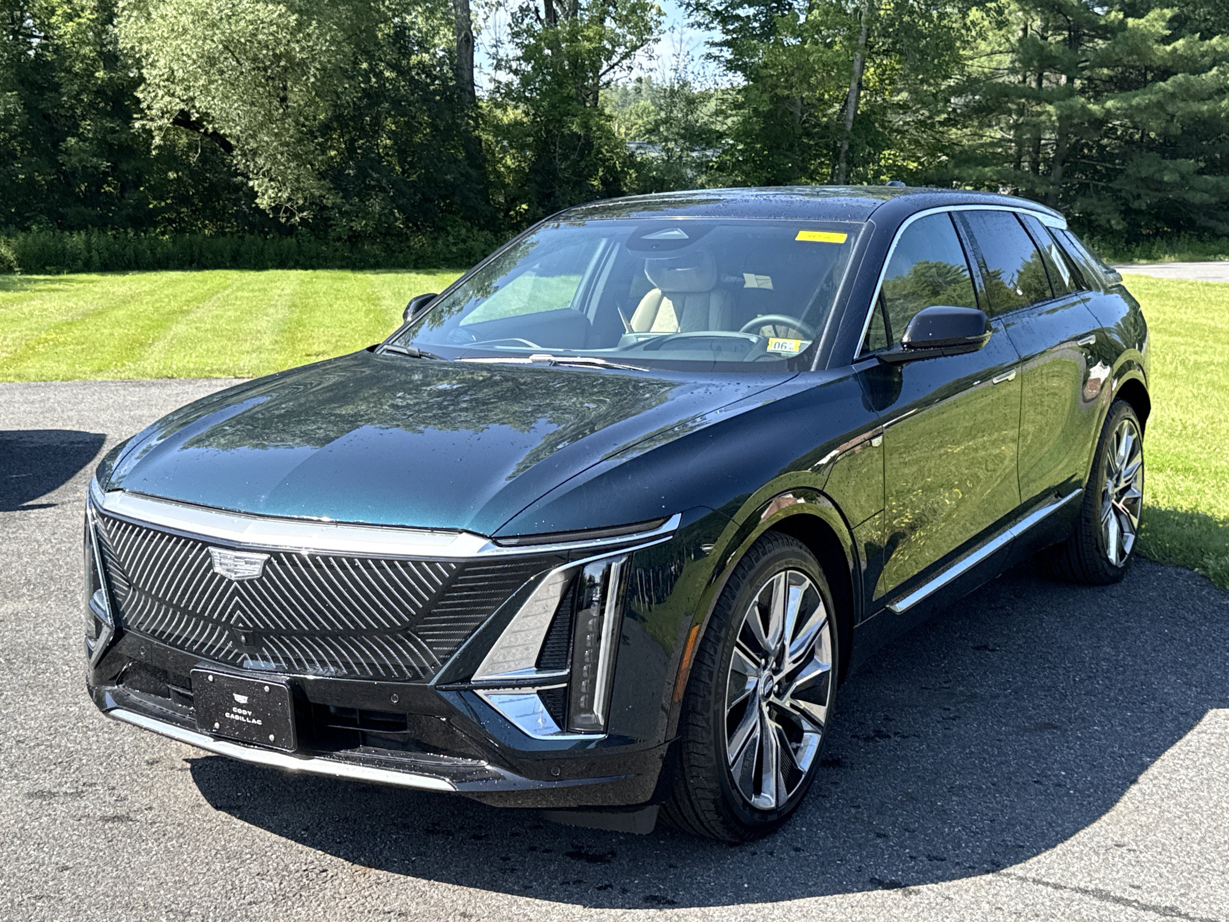 2026 Cadillac LYRIQ Signature Luxury in Emerald Lake Metallic — front three-quarter view