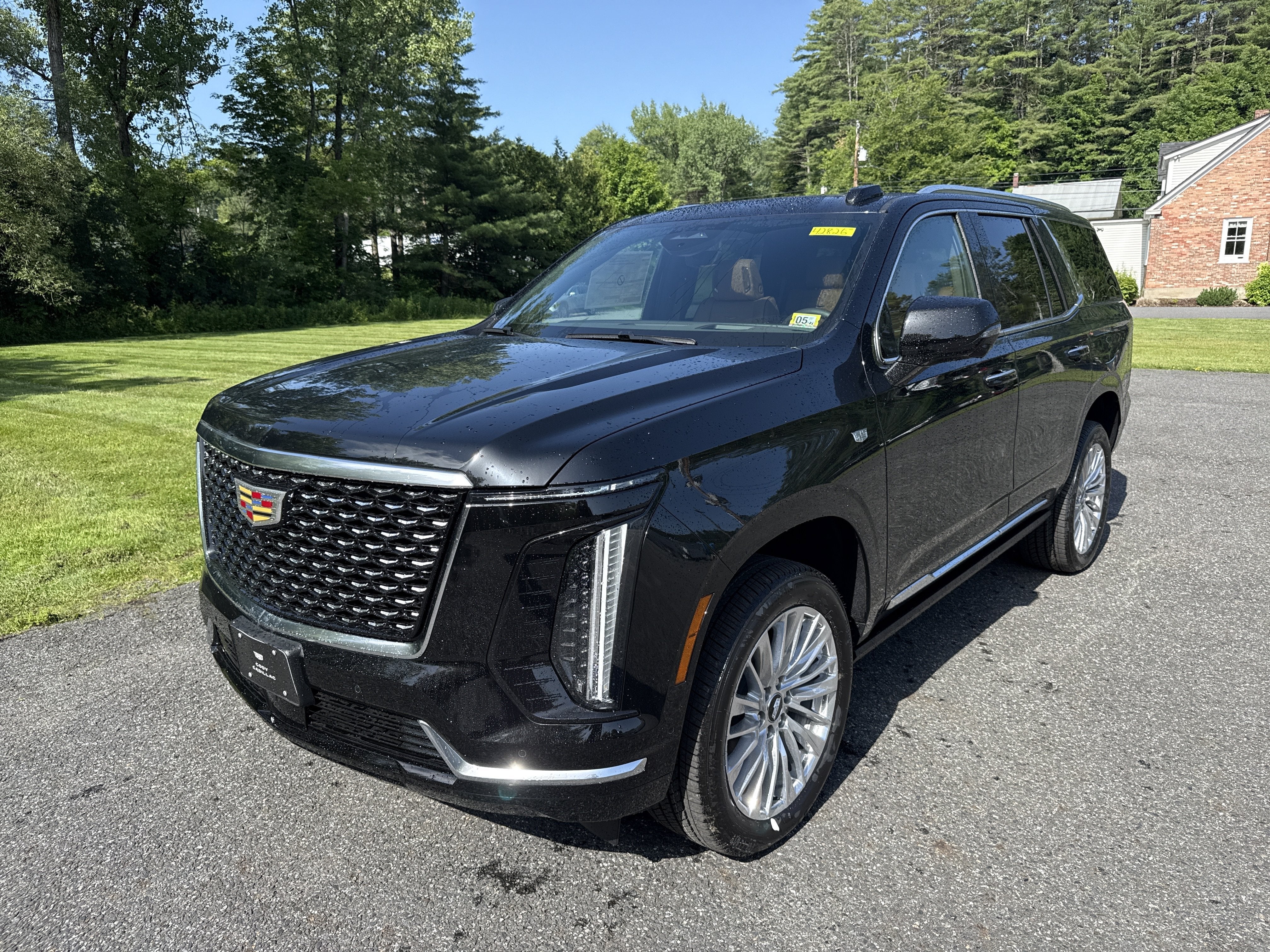 2026 Cadillac Escalade Luxury in Black Raven — front three-quarter view